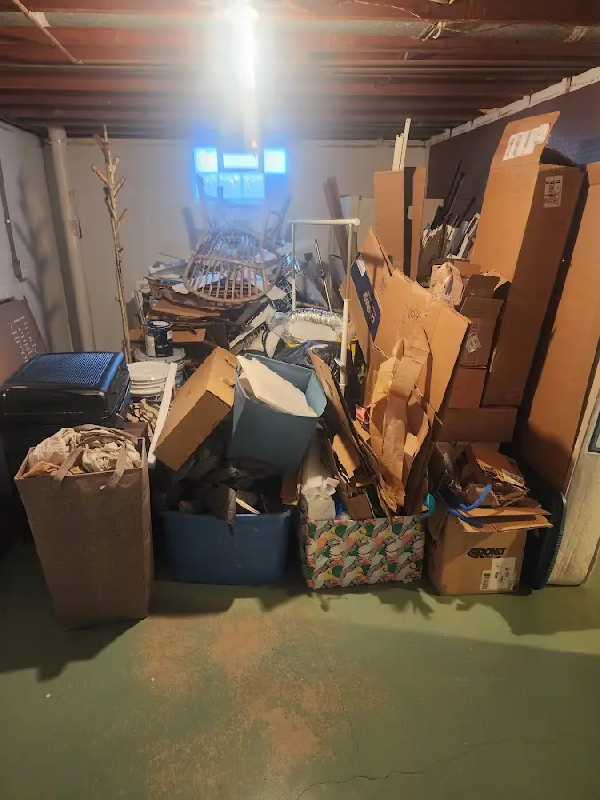 Roll-off dumpster container at job site for 20 Yard Dumpster Rental in Rockingham